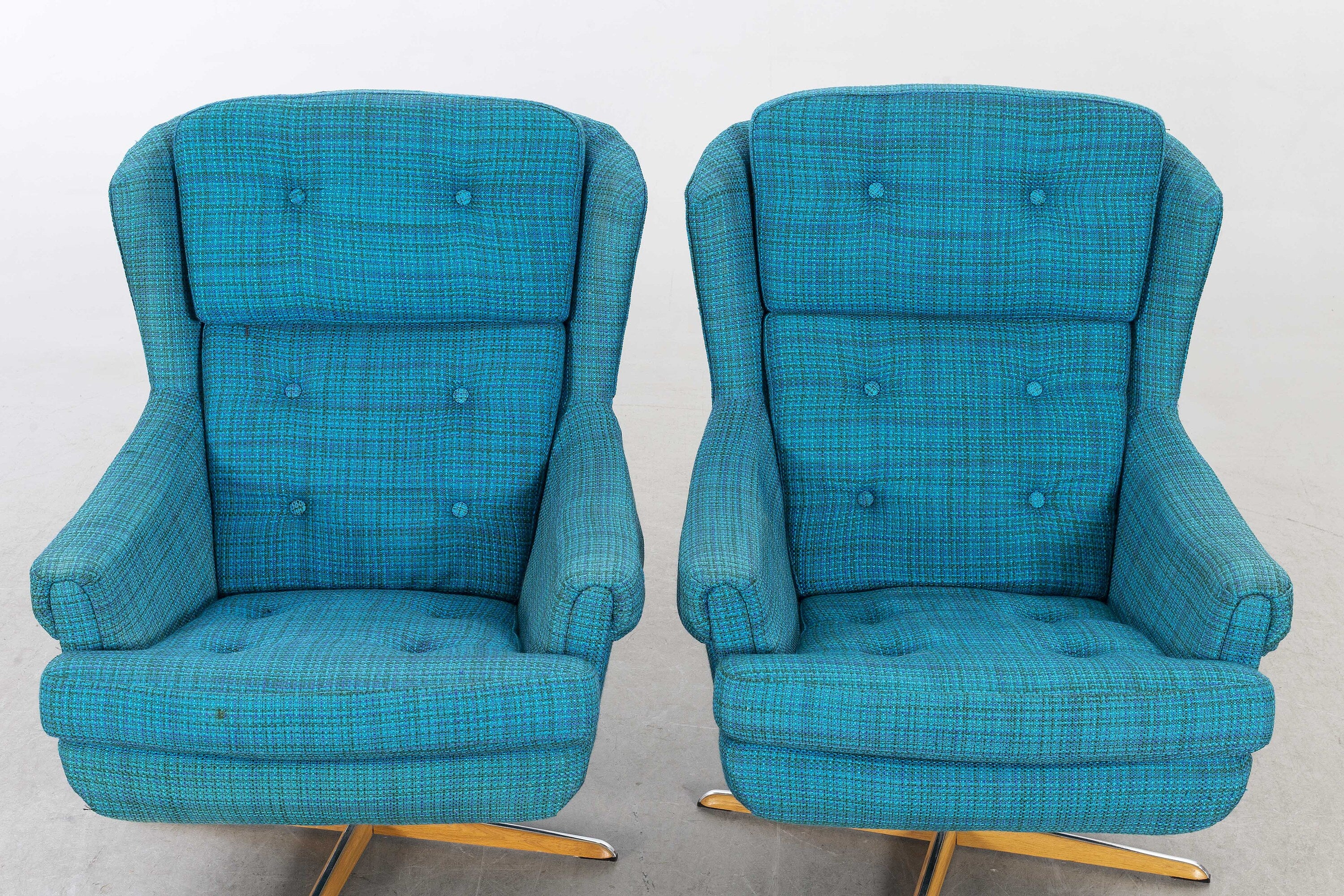 Pair of Mid Century Bröderna Andersson swivel armchairs